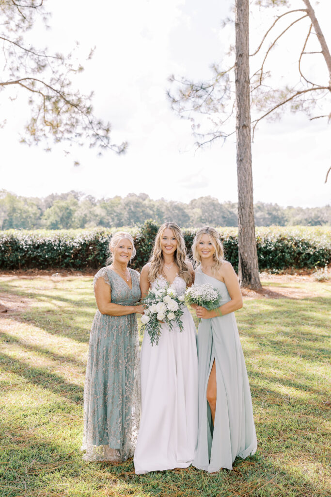bride, her mom, and sister