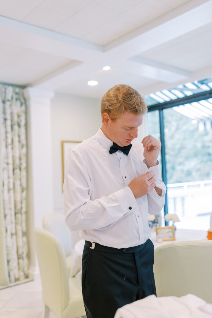 groom getting dressed