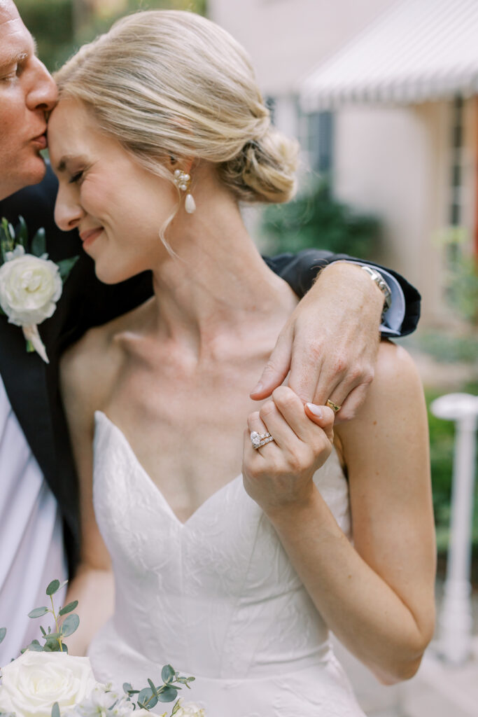 bride and groom kissing
