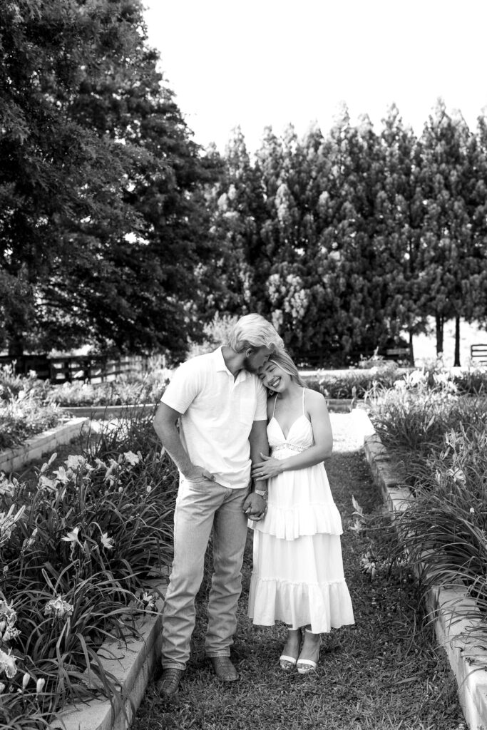 a couple's engagement session at wild daisy farm in molena, georgia