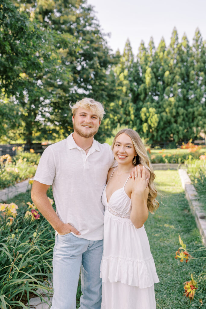 a couple's engagement session at wild daisy farm in molena, georgia