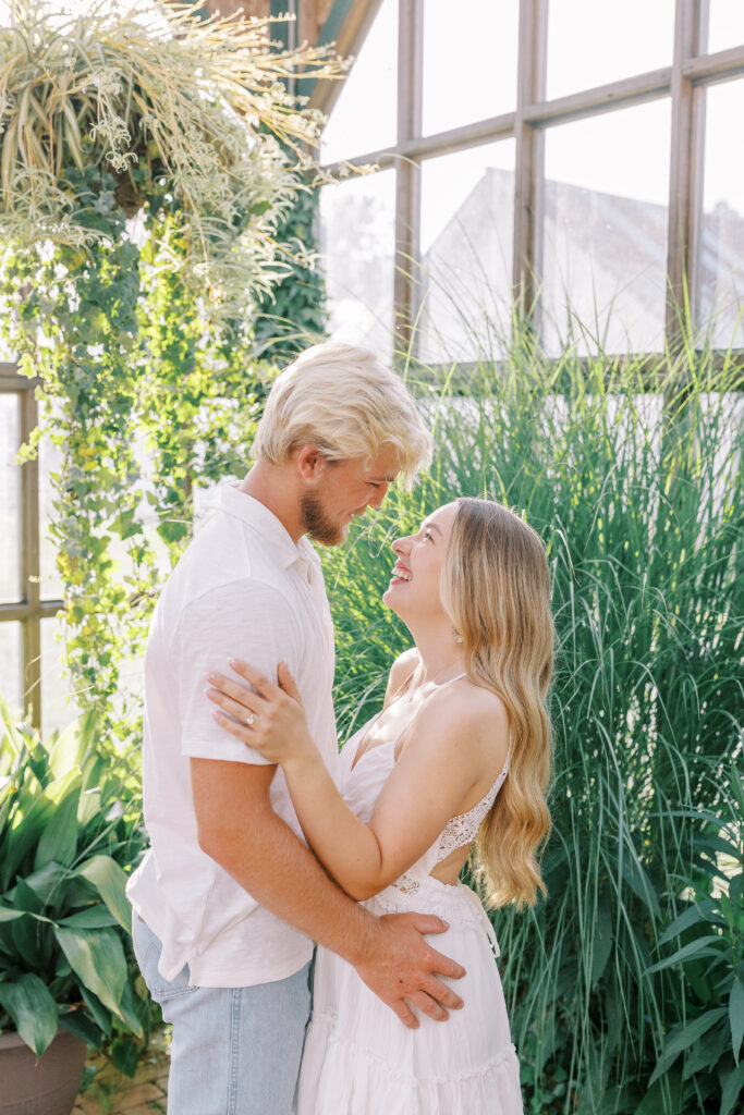 a couple's engagement session at wild daisy farm in molena, georgia