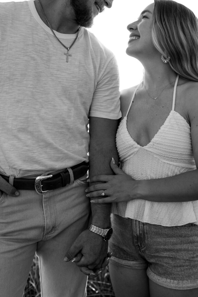 a couple's engagement session at wild daisy farm in molena, georgia