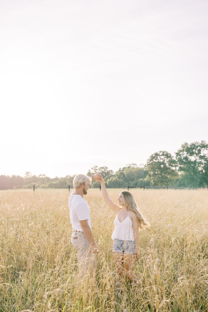 a couple's engagement session at wild daisy farm in molena, georgia