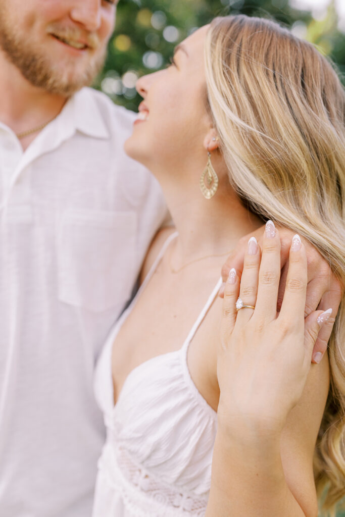 a couple's engagement session at wild daisy farm in molena, georgia