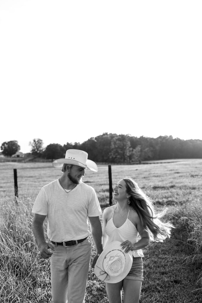 a couple's engagement session at wild daisy farm in molena, georgia