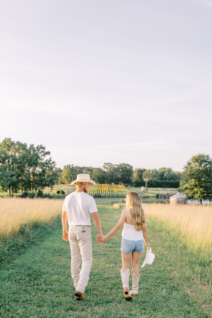a couple's engagement session at wild daisy farm in molena, georgia