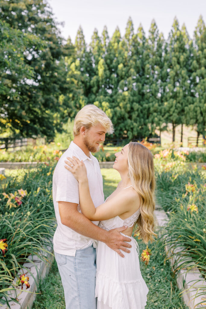 a couple's engagement session at wild daisy farm in molena, georgia