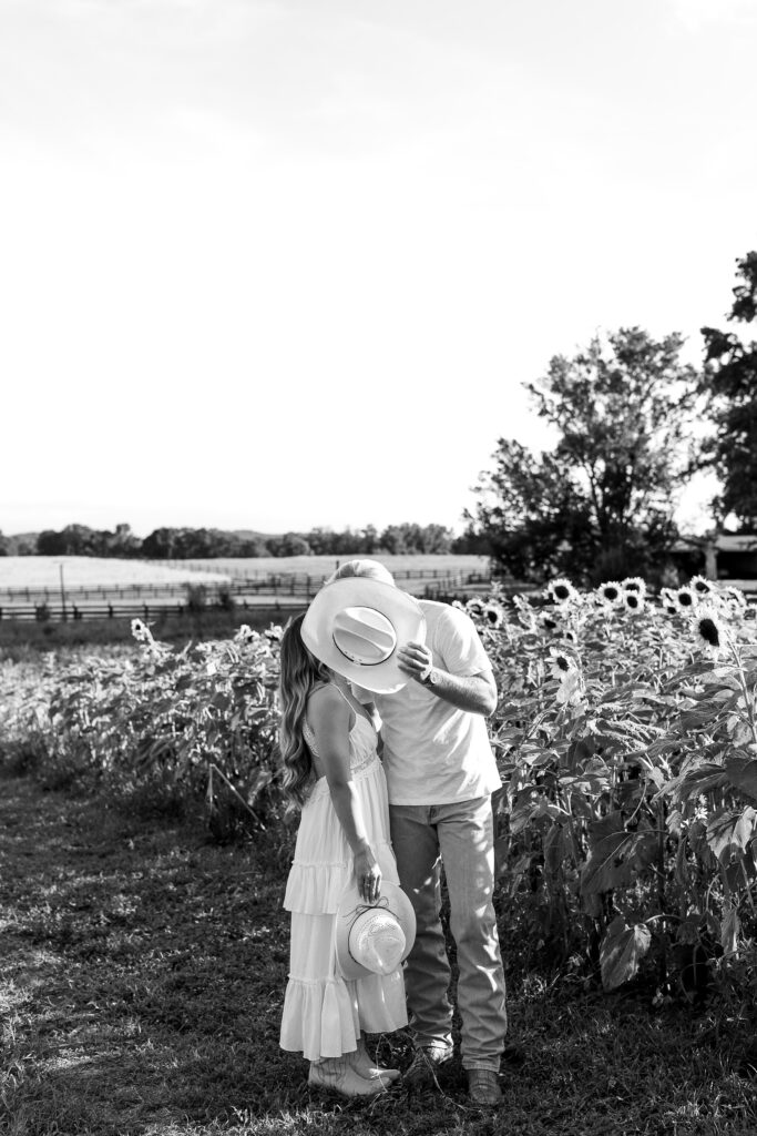 a couple's engagement session at wild daisy farm in molena, georgia