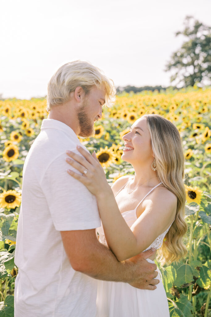 a couple's engagement session at wild daisy farm in molena, georgia