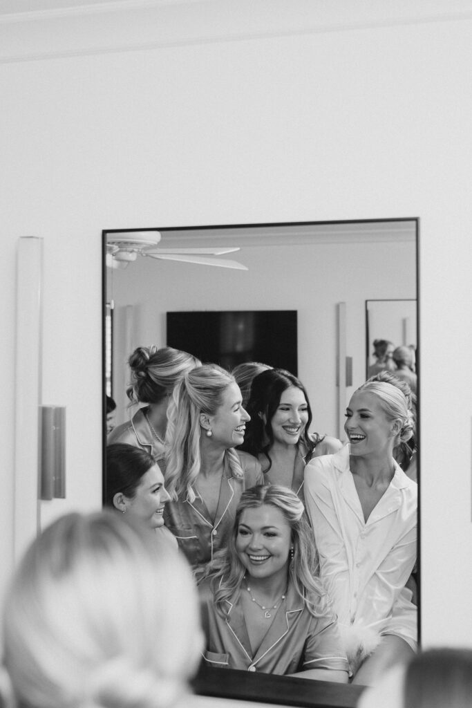 bride and her bridesmaids getting ready