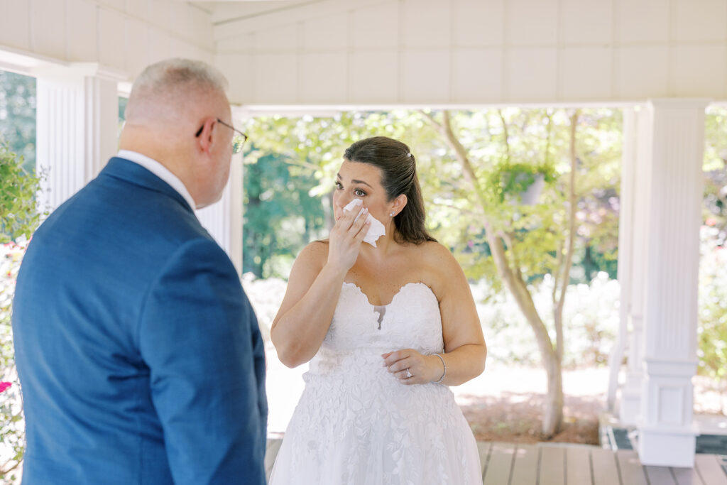 bride crying with her dad