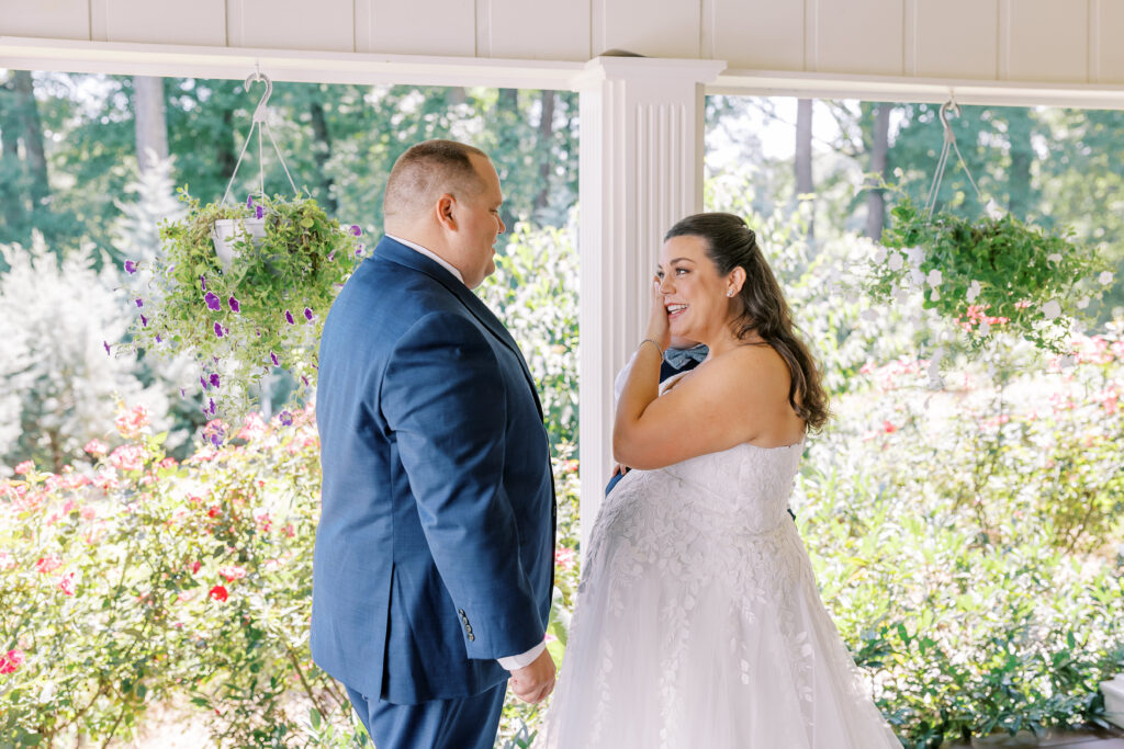 groom and son first look with bride