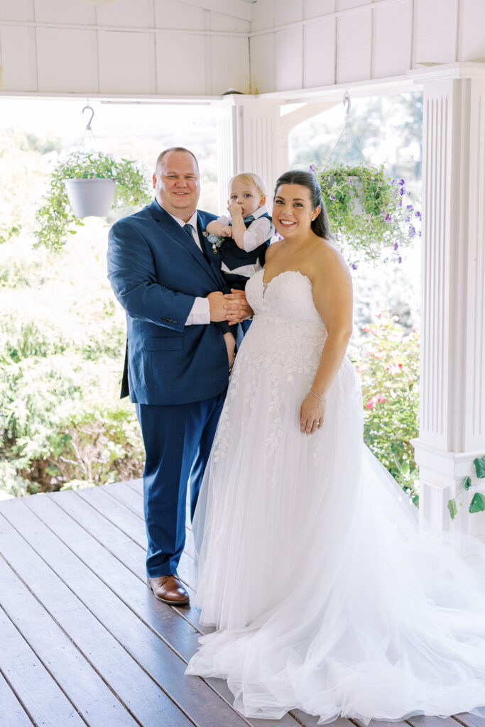 groom and son first look with bride
