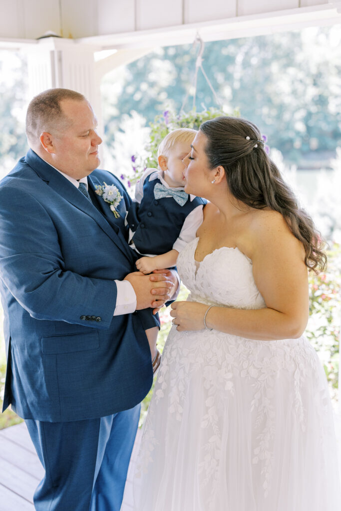 groom and son first look with bride