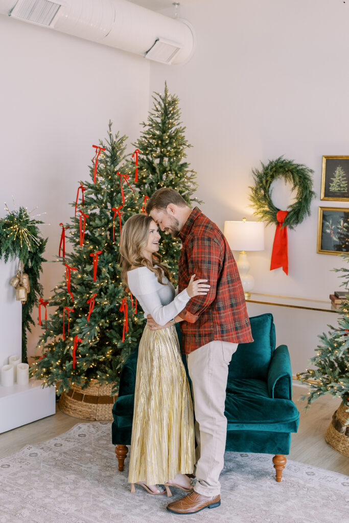 a couple's christmas engagement session at birdie & co studio in athens, ga