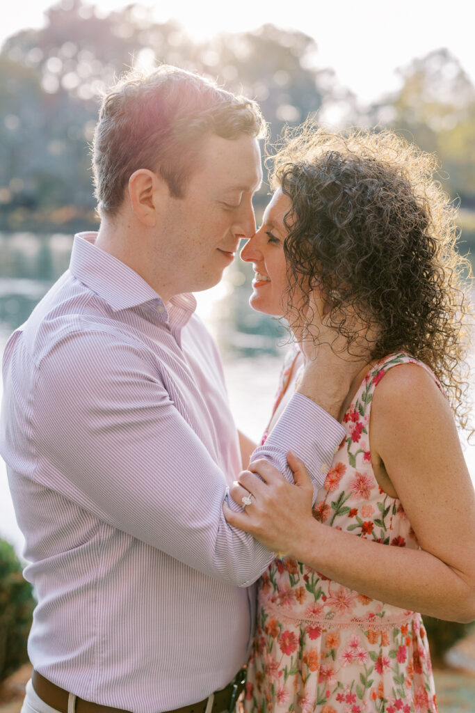 a couple having their engagement session on the banks of the chattahoochee river
