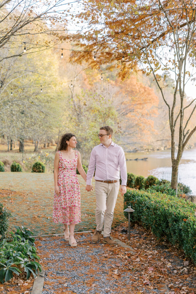 a couple having their engagement session on the banks of the chattahoochee river