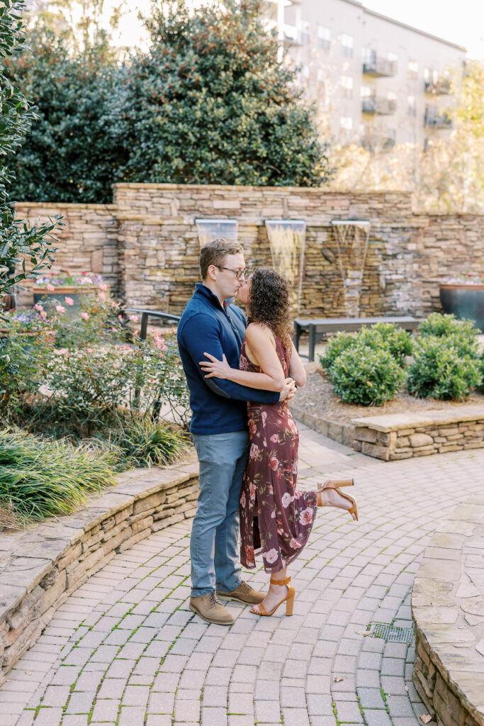 a couple having an engagement session in the sandy springs neighborhood of atlanta