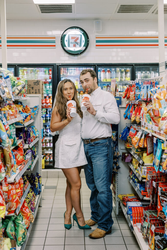 a couple taking a save the date photography session at the 7 Eleven gas station
