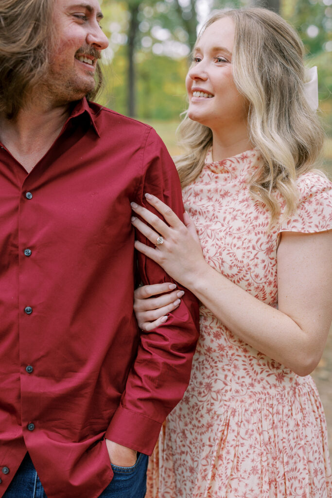 a couple taking an engagement photography session at winn park in atlanta, georgia