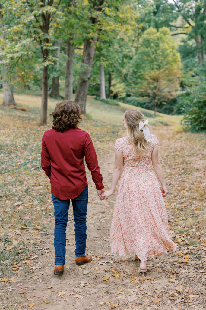 a couple taking an engagement photography session at winn park in atlanta, georgia