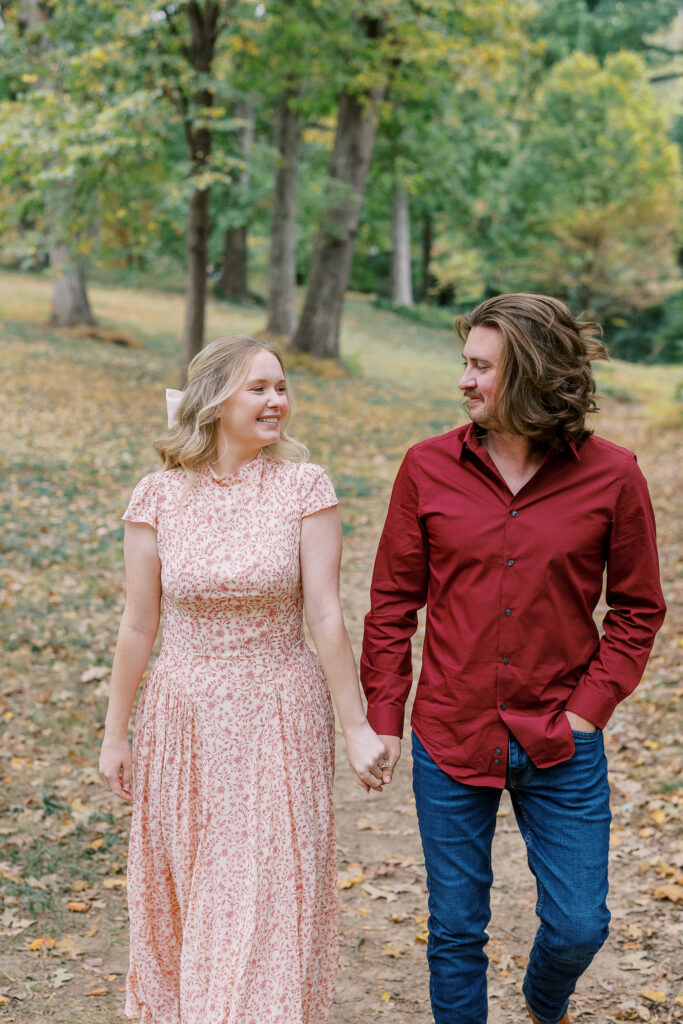 a couple taking an engagement photography session at winn park in atlanta, georgia