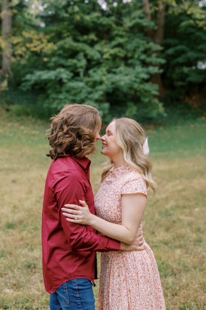 a couple taking an engagement photography session at winn park in atlanta, georgia