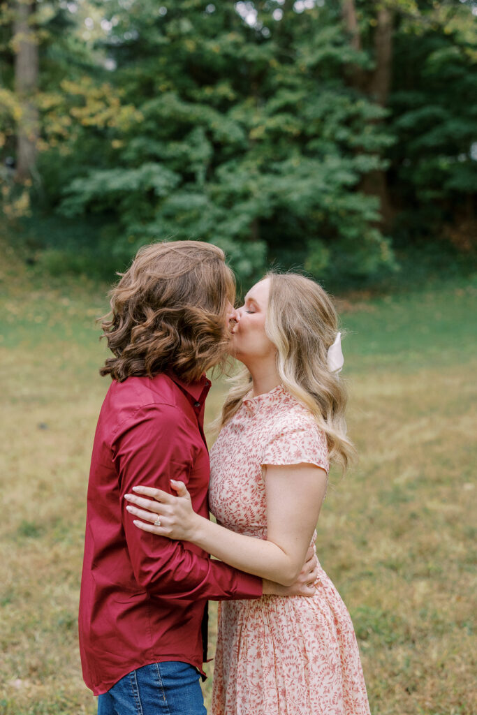 a couple taking an engagement photography session at winn park in atlanta, georgia