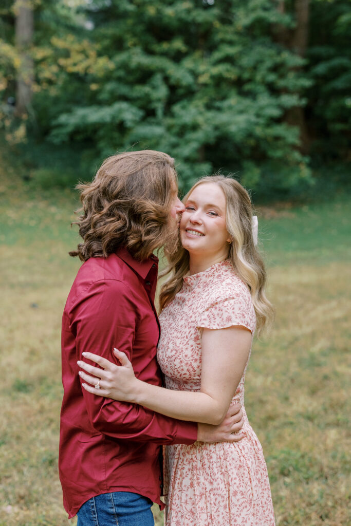 a couple taking an engagement photography session at winn park in atlanta, georgia