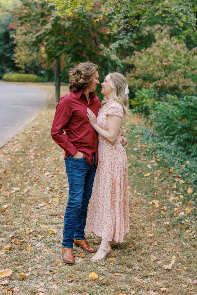 a couple taking an engagement photography session at winn park in atlanta, georgia