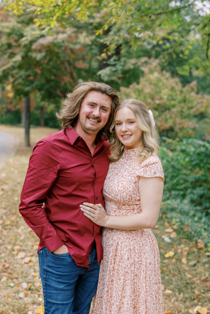 a couple taking an engagement photography session at winn park in atlanta, georgia