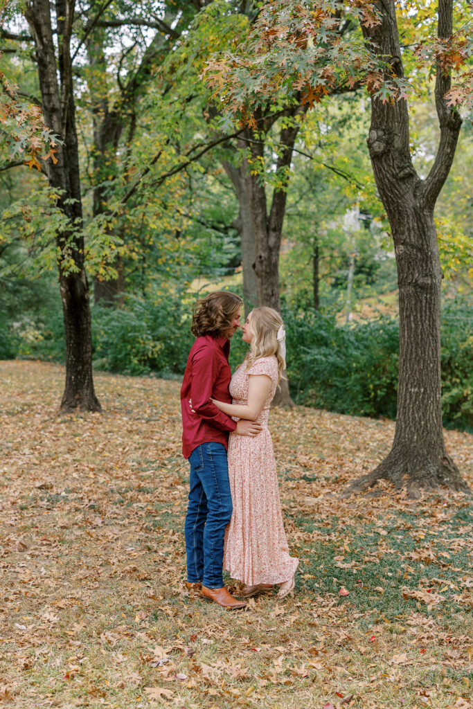 a couple taking an engagement photography session at winn park in atlanta, georgia