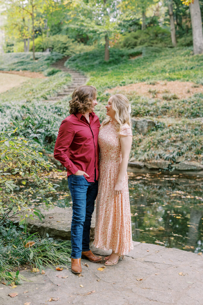 a couple taking an engagement photography session at winn park in atlanta, georgia