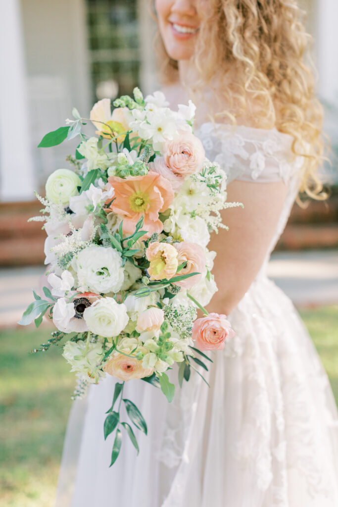 a stylized luxury garden wedding editorial photography session at the garden outside athens, georgia formerly known as the thompson house and garden by sarah folsom photography, alexis lunsford photography, and oakwood lace and co