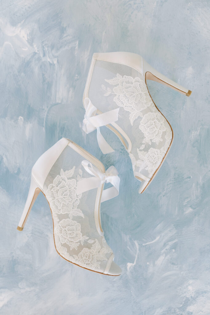 a stylized luxury garden wedding editorial photography session at the garden outside athens, georgia formerly known as the thompson house and garden by sarah folsom photography, alexis lunsford photography, and oakwood lace and co