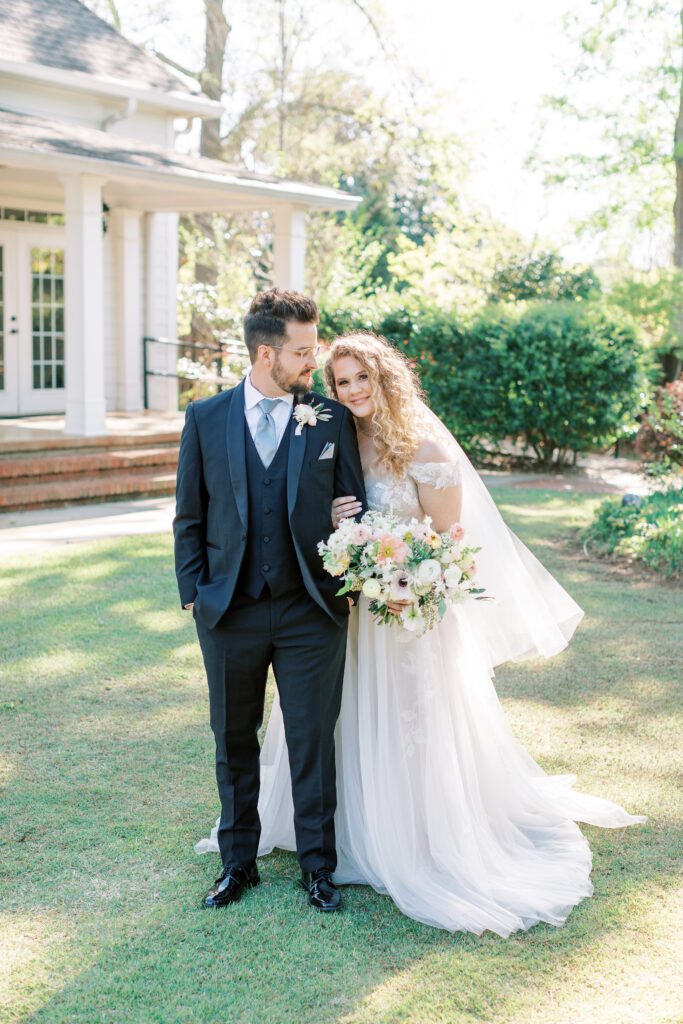 a stylized luxury garden wedding editorial photography session at the garden outside athens, georgia formerly known as the thompson house and garden by sarah folsom photography, alexis lunsford photography, and oakwood lace and co