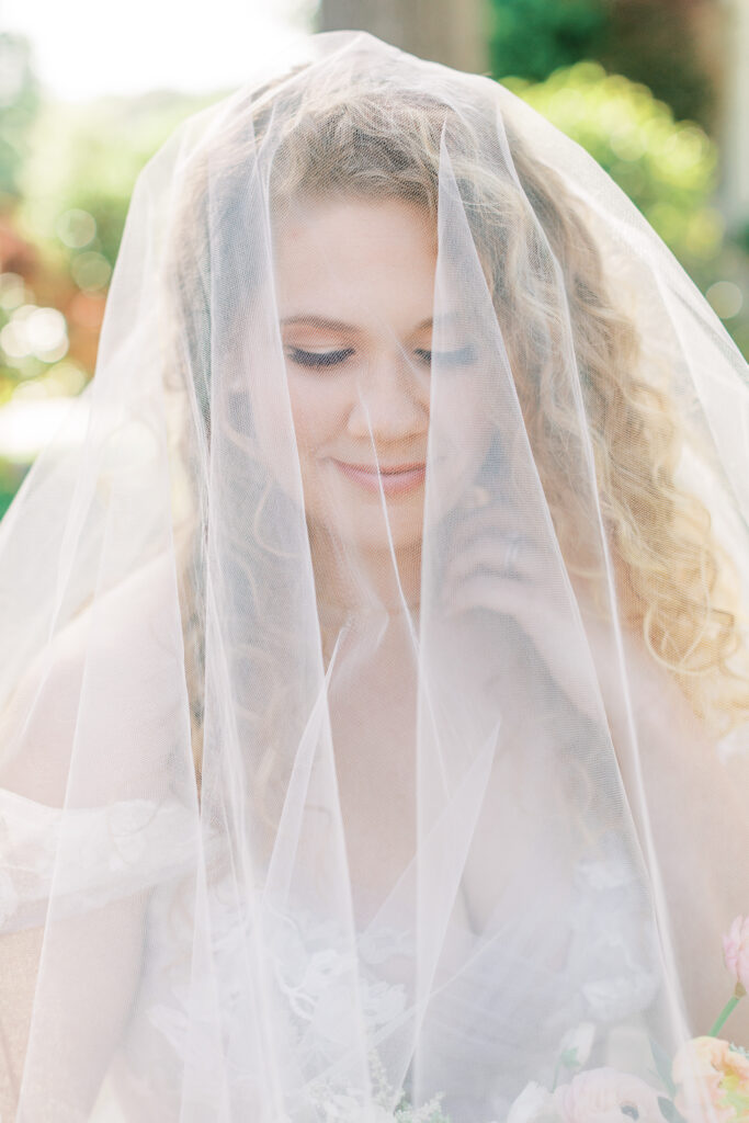 a stylized luxury garden wedding editorial photography session at the garden outside athens, georgia formerly known as the thompson house and garden by sarah folsom photography, alexis lunsford photography, and oakwood lace and co