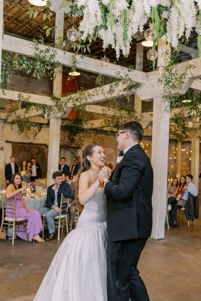 A photo from a wedding reception held at Guardian Works in Atlanta, balancing elegance and industrial.