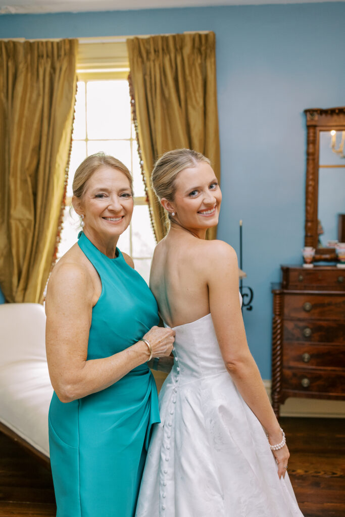 bride and her mom getting ready