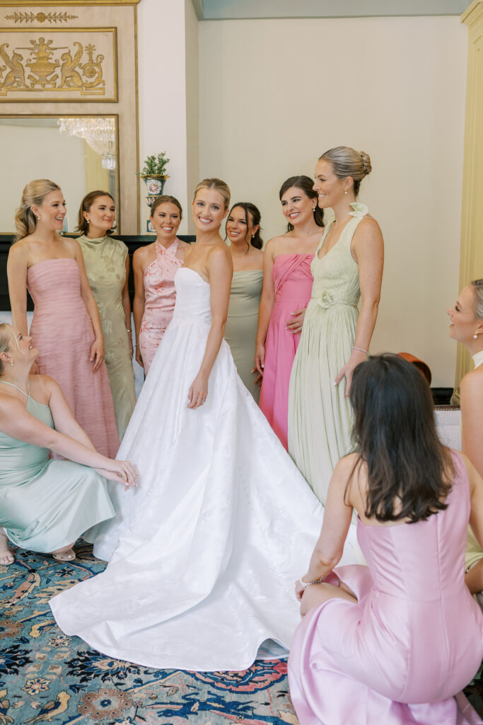 bride and her bridesmaids getting ready