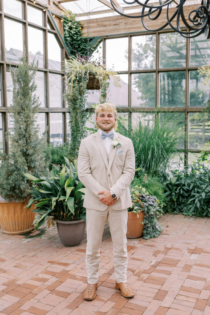 groom portrait at the wild daisy farm