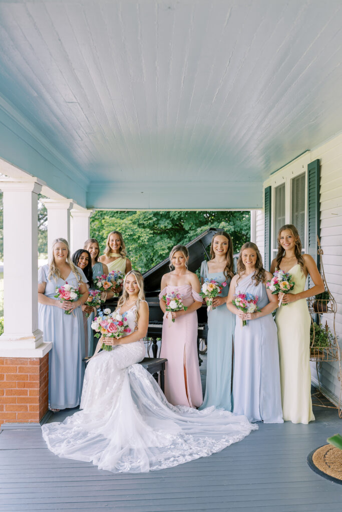 bride and her bridesmaids on the piano